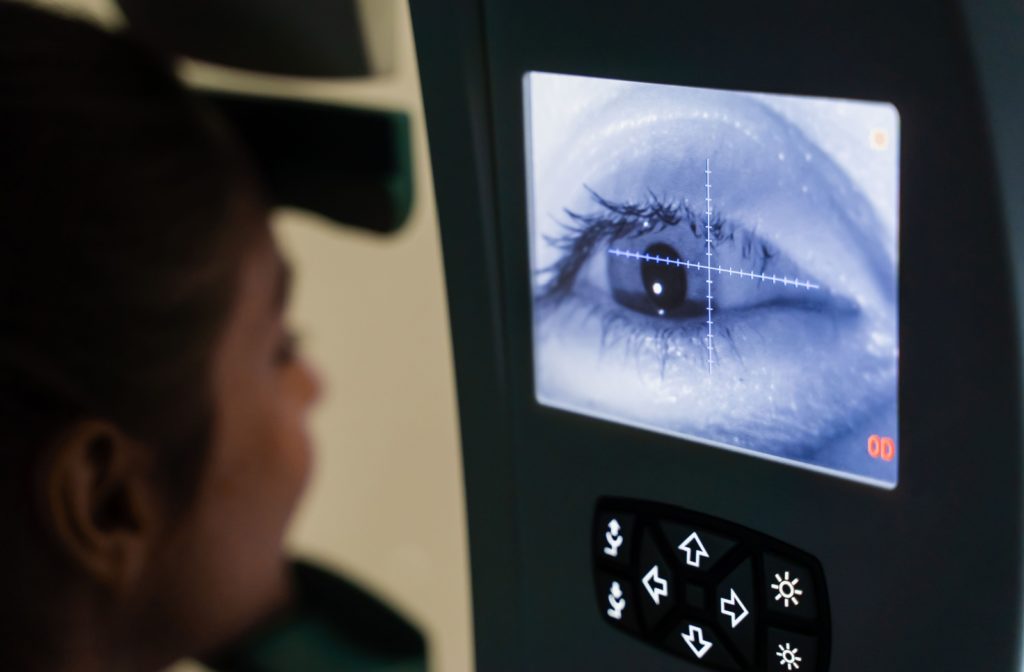 A person undergoing a field vision test.