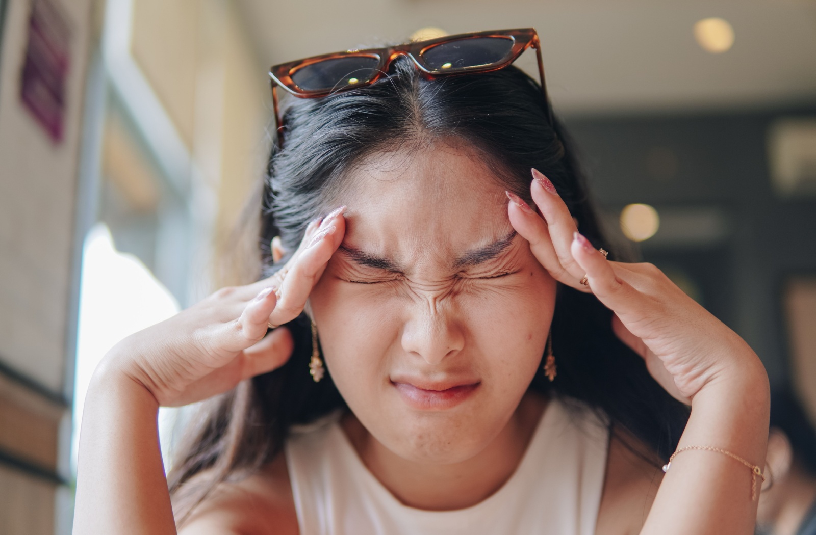 Why Do Sunglasses Give Me a Headache? | Total Vision